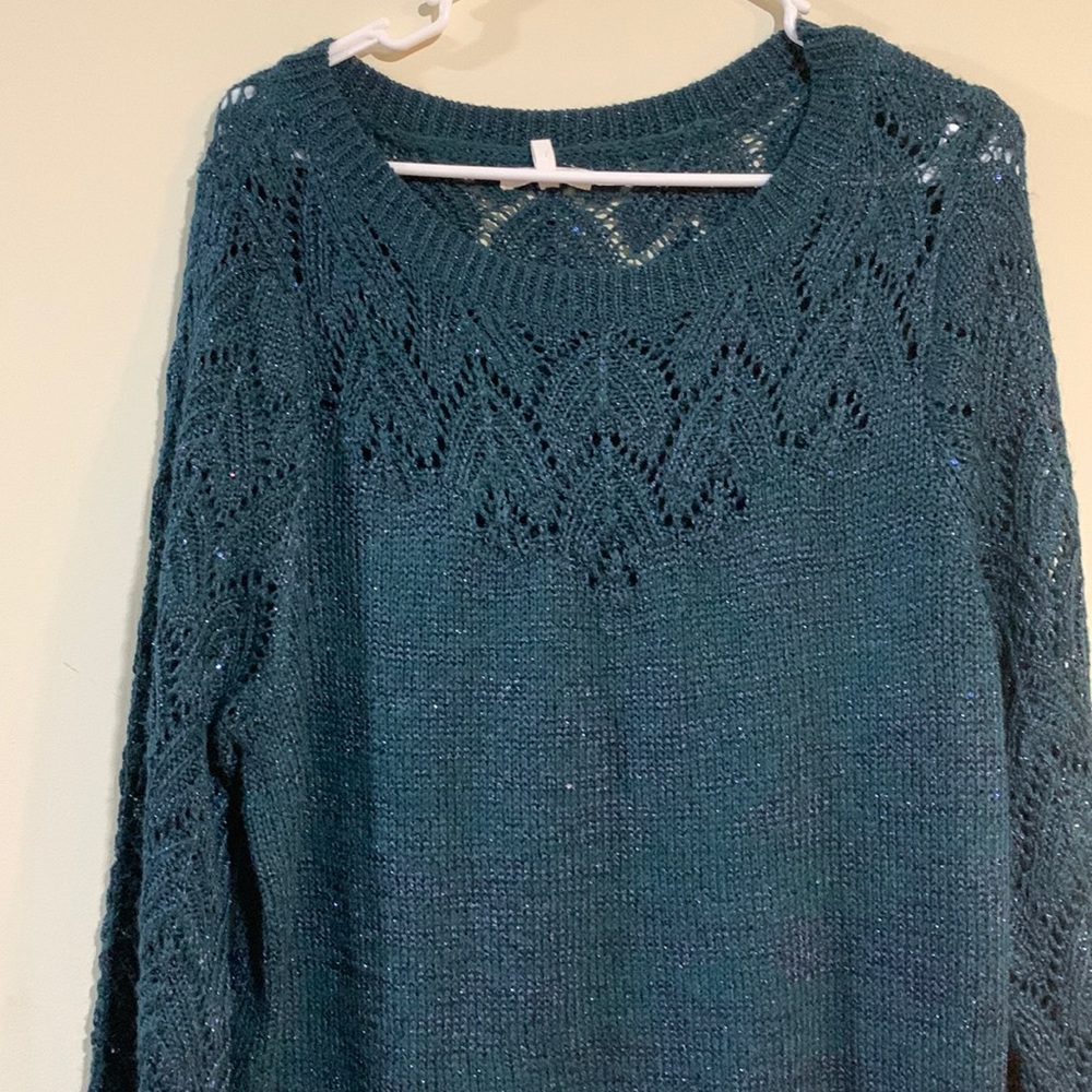 Nice green sweater.